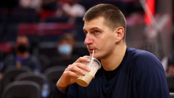 SAN FRANCISCO, CALIFORNIA - OCTOBER 06: Nikola Jokic #15 of the Denver Nuggets takes a drink on the bench during their game against the Golden State Warriors at Chase Center on October 06, 2021 in San Francisco, California. NOTE TO USER: User expressly acknowledges and agrees that, by downloading and/or using this photograph, User is consenting to the terms and conditions of the Getty Images License