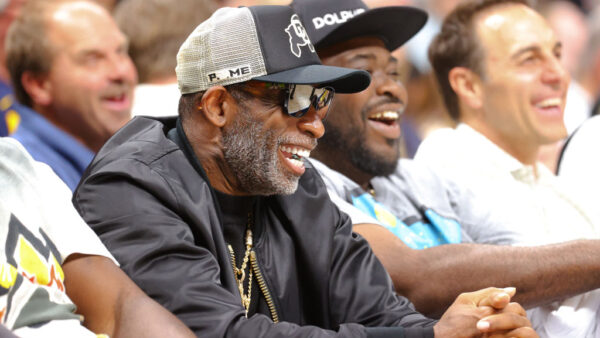 DENVER, COLORADO - OCTOBER 24: Head coach Deion Sanders of the Colorado Buffaloes attends the game between the Denver Nuggets and the Los Angeles Lakers in the NBA Opening night at Ball Arena on October 24, 2023 in Denver, Colorado. NOTE TO USER: User expressly acknowledges and agrees that, by downloading and/or using this Photograph, user is consenting to the terms and conditions of the Getty Images License Agreement.