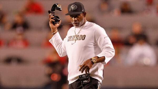 SALT LAKE CITY, UT - OCTOBER 25: Head coach Deion Sanders of the Colorado Buffaloes takes off his head set during the first half of their game against the Utah Utes at Rice Eccles Stadium on October 25, 2025 in Salt Lake City, Utah.