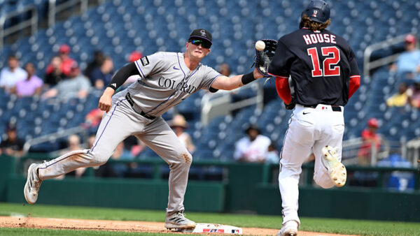 WASHINGTON, DC - AUGUST 27: TJ Rumfield #7 of the Colorado Rockies forces out Brady House #12 of the Washington Nationals at first base in the sixth inning at Nationals Park on August 27, 2026 in Washington, DC.