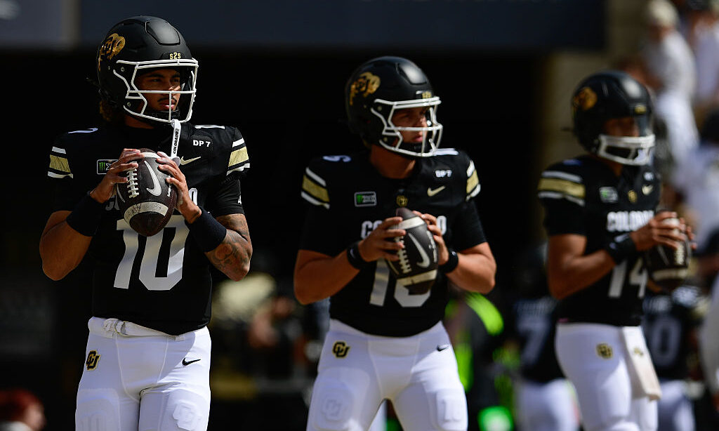 BOULDER, CO - SEPTEMBER 12:From left: Colorado Buffaloes quarterback Julian Lewis, quarterback Isaac Wilson and quarterback Kaneal Sweetwyne warm up before the game against the Weber State Wildcats at Folsom Field in Boulder on Saturday, Sept. 12, 2026.