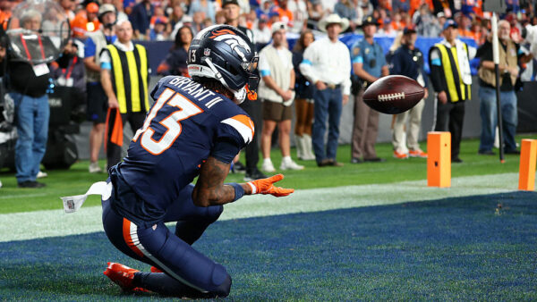 DENVER, COLORADO - SEPTEMBER 27: Pat Bryant #13 of the Denver Broncos makes a catch for a touchdown against the Los Angeles Rams during the third quarter at Empower Field At Mile High on September 27, 2026 in Denver, Colorado.