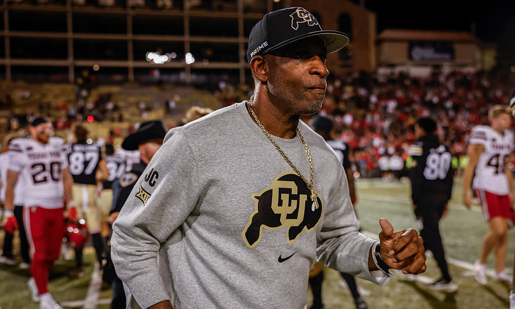 BOULDER, COLORADO - OCTOBER 3: Colorado Buffaloes head coach Deion Sanders jogs off the field after their game against the Texas Tech Red Raiders at Folsom Field on October 3, 2026 in Boulder, Colorado.