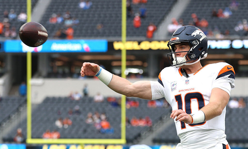 INGLEWOOD, CALIFORNIA - OCTOBER 11: Bo Nix #10 of the Denver Broncos warms up before the game again...