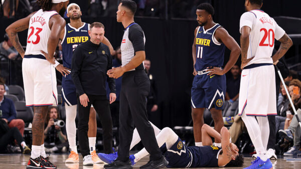 INGLEWOOD, CALIFORNIA - OCTOBER 14: Julian Strawther #1 of the Denver Nuggets reacts after a potential injury as head coach David Adelman, Alpha Diallo #11, and Isaiah Jackson #23 of the Los Angeles Clippers and Blake Wesley #20 look on during the third quarter of a preseason game at Intuit Dome on October 14, 2026 in Inglewood, California. NOTE TO USER: User expressly acknowledges and agrees that, by downloading and or using this photograph, User is consenting to the terms and conditions of the Getty Images License Agreement.