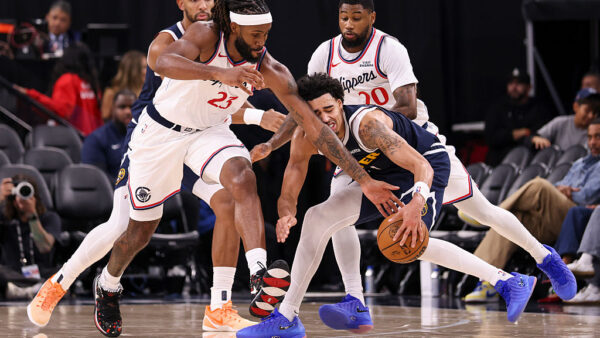 INGLEWOOD, CALIFORNIA - OCTOBER 14: Isaiah Jackson #23 of the Los Angeles Clippers and Julian Strawther #1 of the Denver Nuggets reach for the ball during the third quarter of a preseason game at Intuit Dome on October 14, 2026 in Inglewood, California. NOTE TO USER: User expressly acknowledges and agrees that, by downloading and or using this photograph, User is consenting to the terms and conditions of the Getty Images License Agreement.