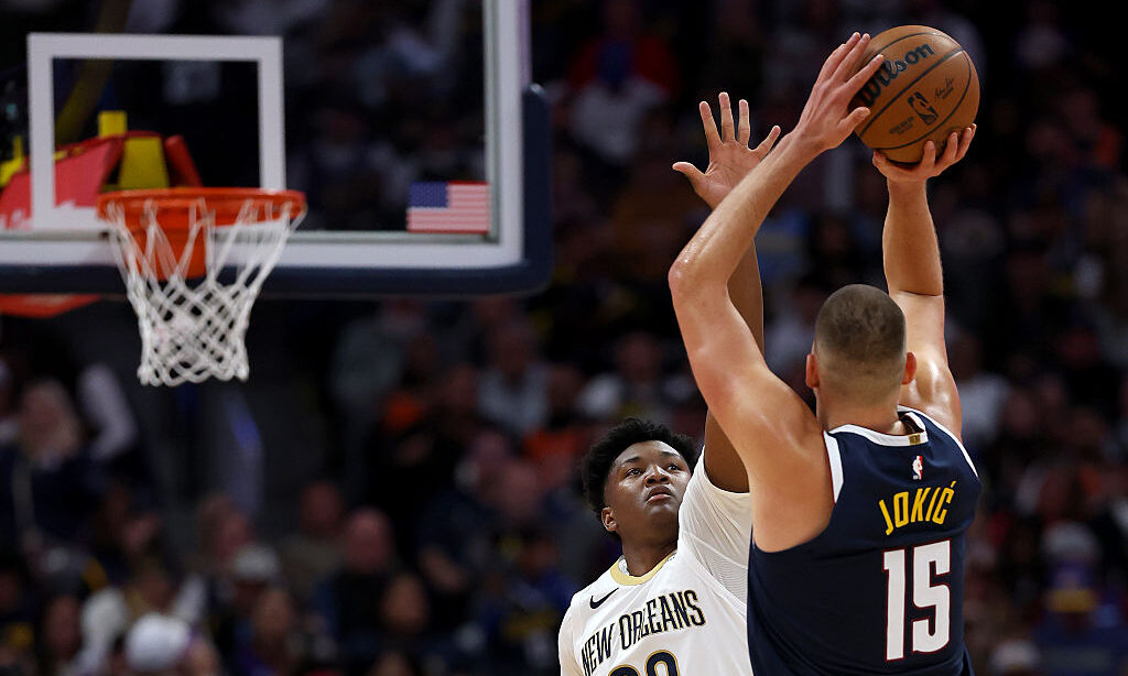 DENVER, COLORADO - OCTOBER 24: Nikola Jokic #15 of the Denver Nuggets puts up a shot against Derik Queen #22 of the New Orleans Pelicans during the first quarter at Ball Arena on October 24, 2026 in Denver, Colorado. NOTE TO USER: User expressly acknowledges and agrees that, by downloading and or using this photograph, User is consenting to the terms and conditions of the Getty Images License Agreement.