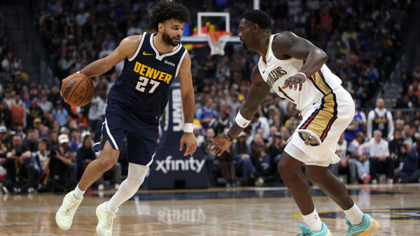 DENVER, COLORADO - OCTOBER 24: Jamal Murray #27 of the Denver Nuggets drives against Zion Williamson #1 of the New Orleans Pelicans during the fourth quarter at Ball Arena on October 24, 2026 in Denver, Colorado. NOTE TO USER: User expressly acknowledges and agrees that, by downloading and or using this photograph, User is consenting to the terms and conditions of the Getty Images License Agreement.