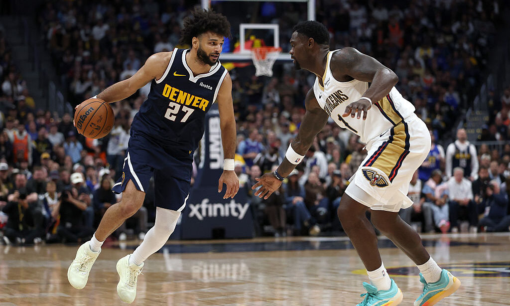DENVER, COLORADO - OCTOBER 24: Jamal Murray #27 of the Denver Nuggets drives against Zion Williamson #1 of the New Orleans Pelicans during the fourth quarter at Ball Arena on October 24, 2026 in Denver, Colorado. NOTE TO USER: User expressly acknowledges and agrees that, by downloading and or using this photograph, User is consenting to the terms and conditions of the Getty Images License Agreement.