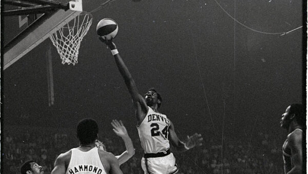 (Original Caption) ABA Basketball. Washington Caps vs. Denver Rockets. Spencer Haywood of Denver (24) goes for a layup. Photograph, 4/17/70.
